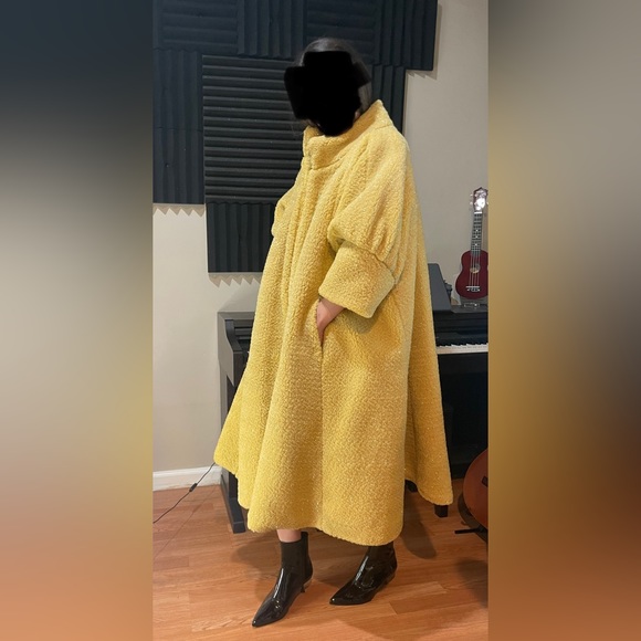 Maison's hand-embroidered coat